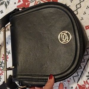 Gorgeous black Bebe crossbody/clutch. NWOT